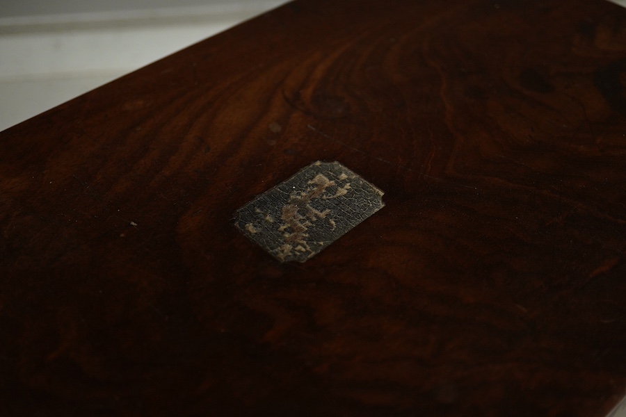 A 19th century brass handled figured mahogany writing slope, 42cm wide, 16cm high. Condition - brass inset plaque to top missing